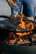 Lade das Bild in den Galerie-Viewer, Multifunktionale Feuerschale „MONTANA X“ 60 cm mit Grillrost 50 cm - Cook King - Shop
